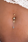 14K Gold Filled Starfish belly button piercing, and a light blue Swarovski crystal bead, The body jewelry you need this summer