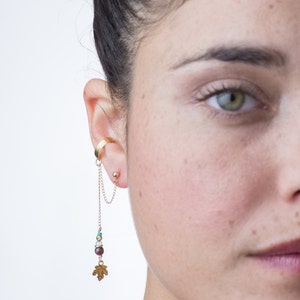 This Goldfilled maple leaf pendant & garnet gemstone, light blue Swarovski crystal bead, ear cuff earring, a unique wedding jewelry look
