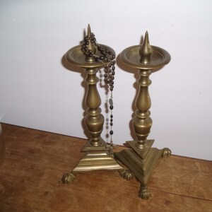 TWO BRONZE CANDLESTICKS. Church candleholder