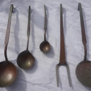 Set of 5 kitchen utensils handmade hammered copper ladles, skimmer and fork, 1930s
