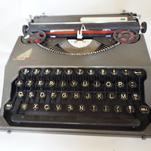 Hermes Baby, Vintage Portable Typewriter with case, Made in Switzerland, 1937