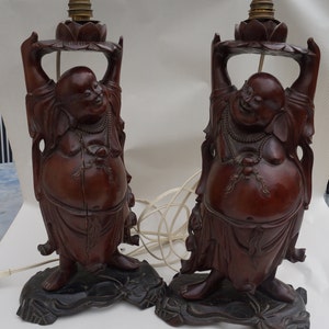 Large vintage pair Buddha laughing wooden statues . Two Asian carved wooden  statues