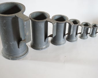 Set of 6 pewter measures, 1900s