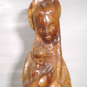 Large sculpture Madonna with Child. Virgin and Child, in wood. Statue of the Virgin with the Child. Virgin Mary with  Child wooden statue