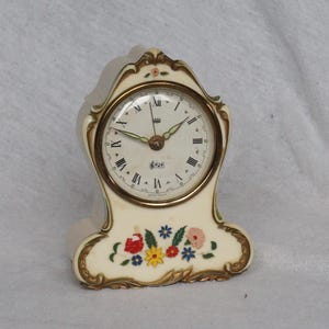 Vintage musical clock from 1970, functional, mechanical, collectible