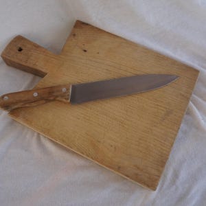 French oak butcher board, cutting board. Thick block of wood