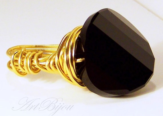 Anillo swarovski negro mujer sale