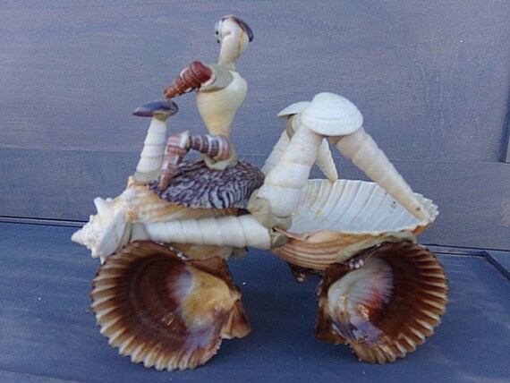Repaired Excellent Condition Shell Craft Sea Shell ATV And Driver 6 12Inches  By 3 Inches By 5 Inches Unusual Collectible Figurine