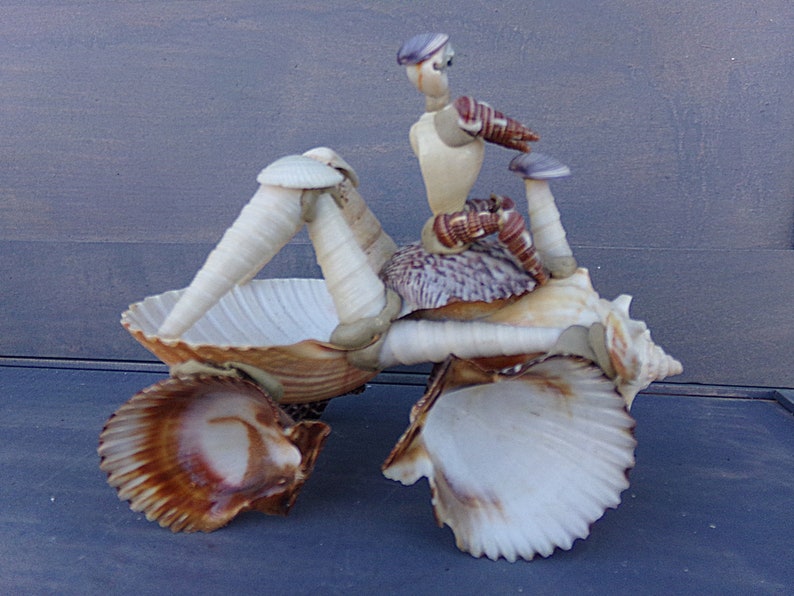 Repaired Excellent Condition Shell Craft Sea Shell ATV And Driver 6 12Inches By 3 Inches By 5 Inches Unusual Collectible Figurine
