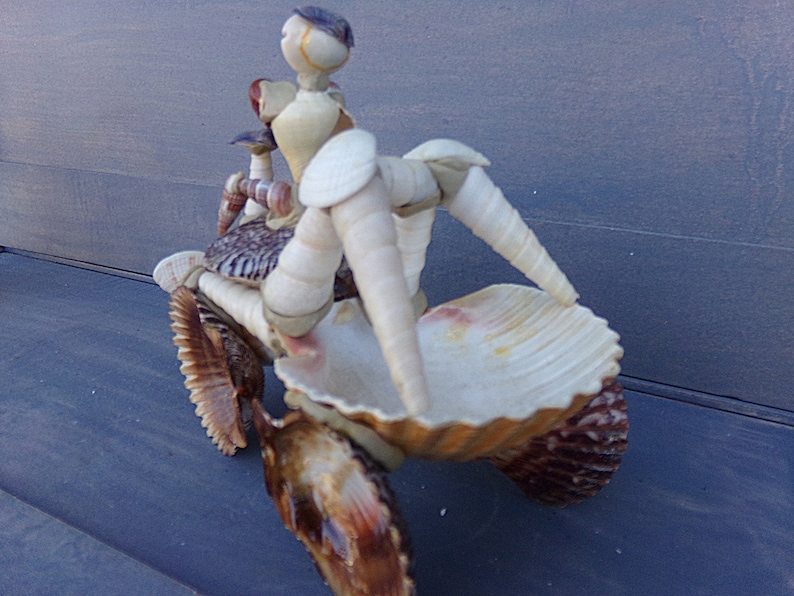 Repaired Excellent Condition Shell Craft Sea Shell ATV And Driver 6 12Inches By 3 Inches By 5 Inches Unusual Collectible Figurine