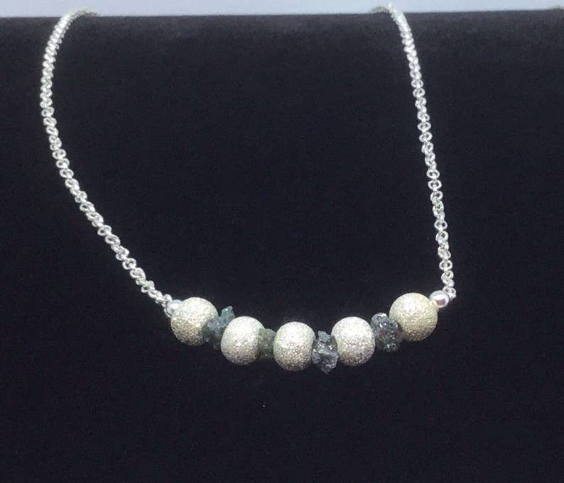 Green diamond and sterling silver Stardust necklace.