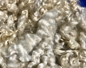 Shiny mohair fleece, hand washed and hand pulled. Pristine, beautiful locks 3.5 x 4.5 long, 4 ounces washed, perfect curls, ready to use.
