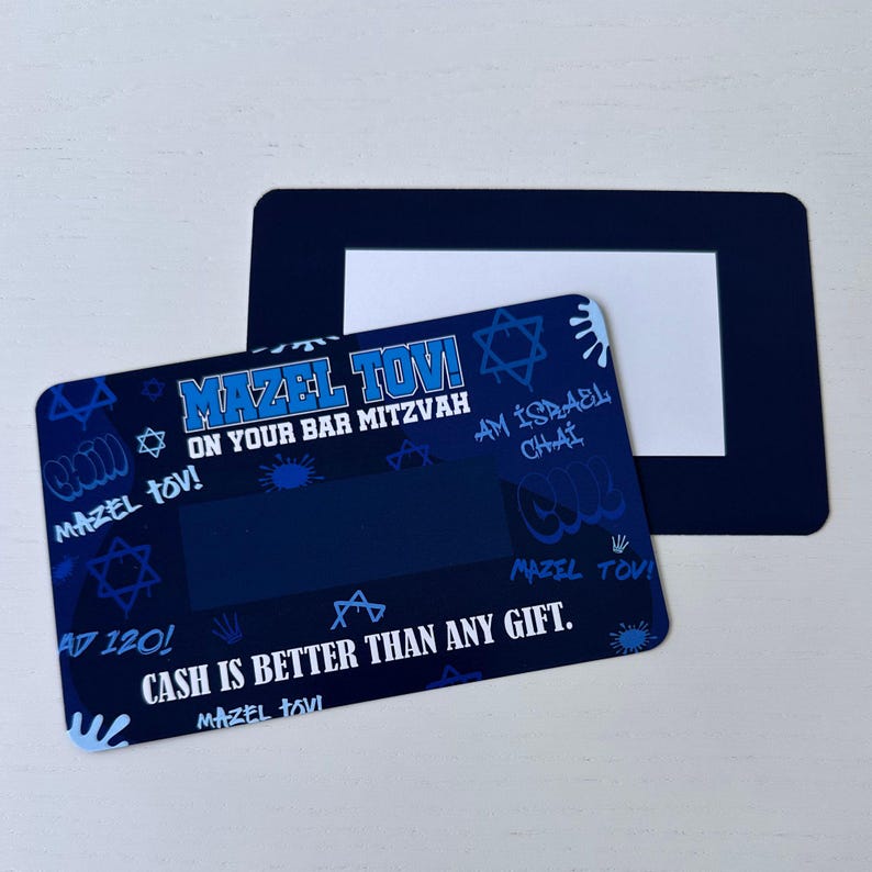 May include: Blue and white card with a graffiti-style design featuring the text "Mazel Tov! On Your Bar Mitzvah" and "Cash is better than any gift."