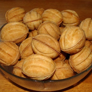 Oreshki delicious walnut shaped Russian cookies with caramel (dulce de leche) and walnuts holiday gift treat
