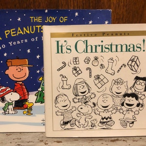 Two Charlie Brown Peanuts Christmas Books The Joy Of A Peanuts Christmas & It&#39;s Christmas