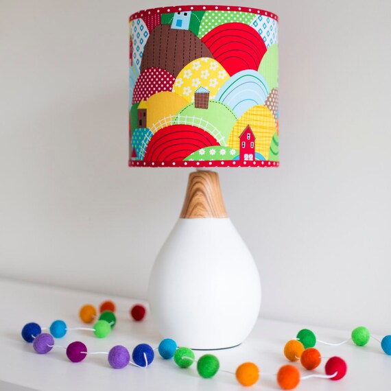 Items similar to Children's barrel lamp shade with bright rainbow hills