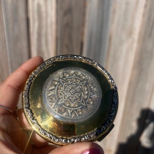 Vintage engraved compact