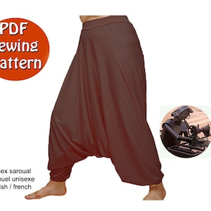 May include: PDF sewing pattern for a unisex sarouel, also known as a  "harem pants" style. The pattern is available in both English and French. The image shows a brown sarouel being worn by a person.