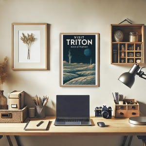 May include: A vintage-style poster advertising a visit to Triton, the moon of Neptune. The poster features a colorful illustration of a landscape with geysers and a blue planet in the sky. The text on the poster reads "Visit Triton, moon of Neptune."