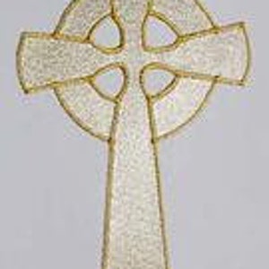 May include: White Celtic cross with a gold outline. The cross is a traditional Irish symbol.