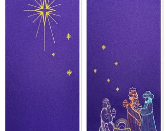 May include: A purple fabric panel with a gold star and a scene of the three wise men kneeling before a manger with a baby inside. The scene is embroidered in gold, white, and blue thread.