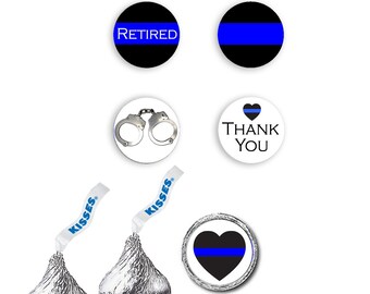 May include: Set of 10 round stickers for Hershey's Kisses featuring a thin blue line design. Stickers include a heart with a thin blue line, handcuffs, a thin blue line, and the words "Retired" and "Thank You".
