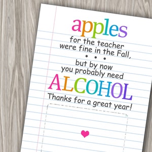 May include: A humorous card with a handwritten message that reads "apples for the teacher were fine in the Fall, but by now you probably need ALCOHOL. Thanks for a great year!" The card has a pink heart in the bottom right corner.