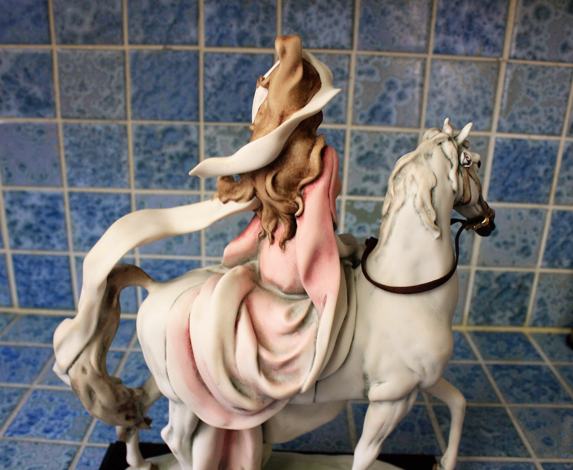 Capodimonte figurine of lady riding horse *By artist G. Armani, signed