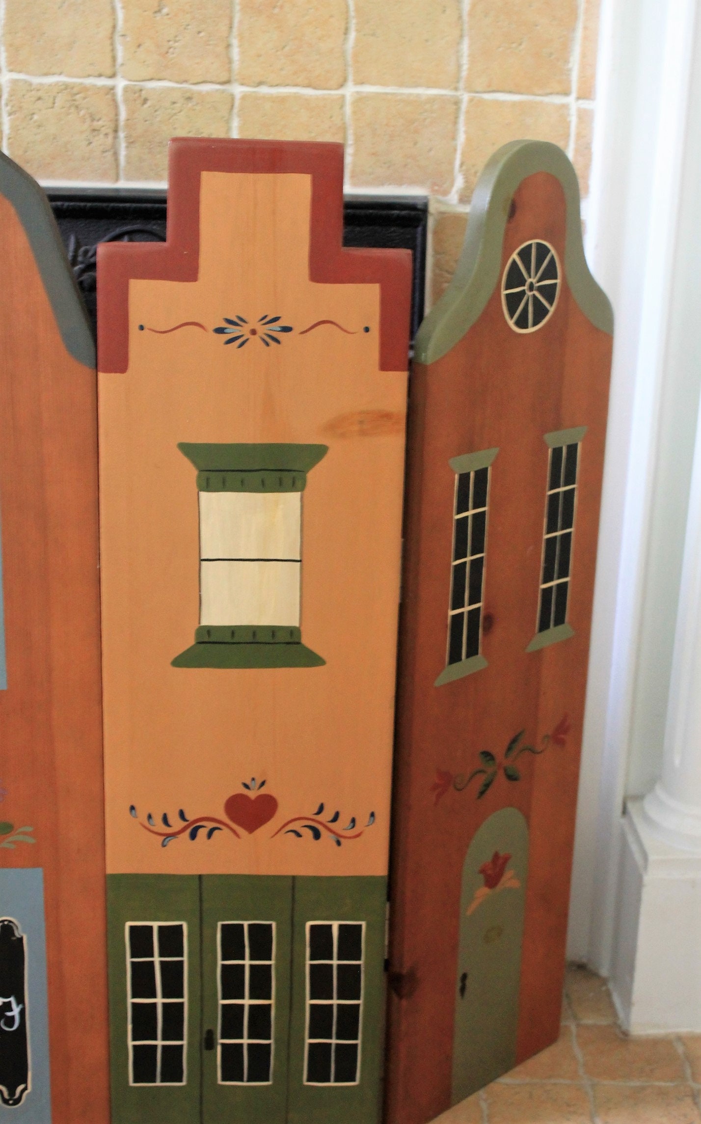 4 Fold hand painted wooden fire screen with row house décor 33” X 45”