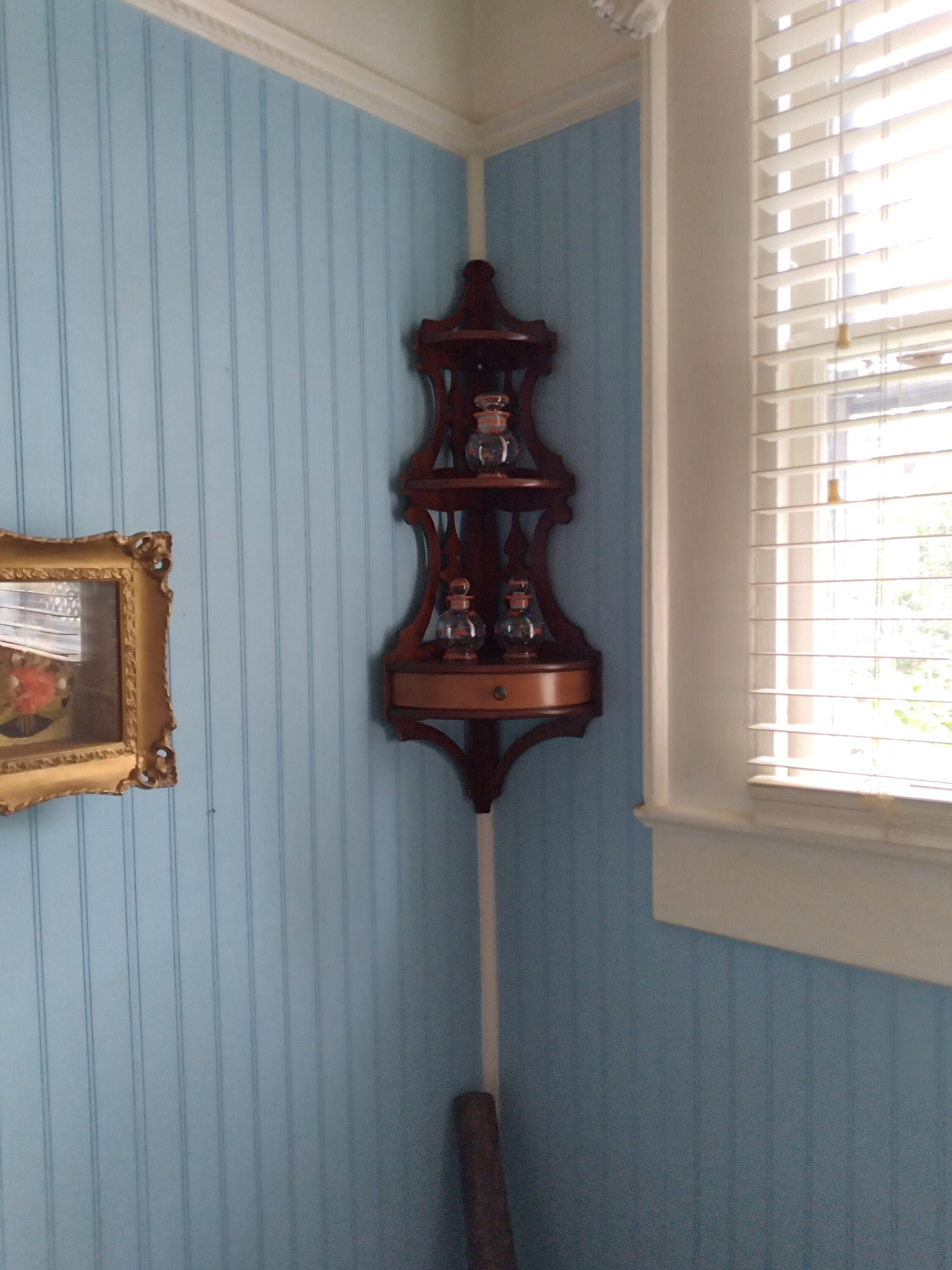 This is a beautiful large ornate antique Victorian hanging corner shelf