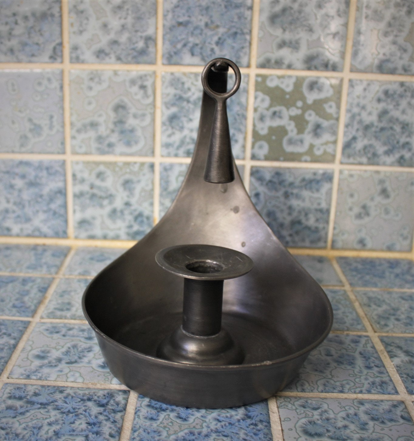 Pewter candlestick and snuffer