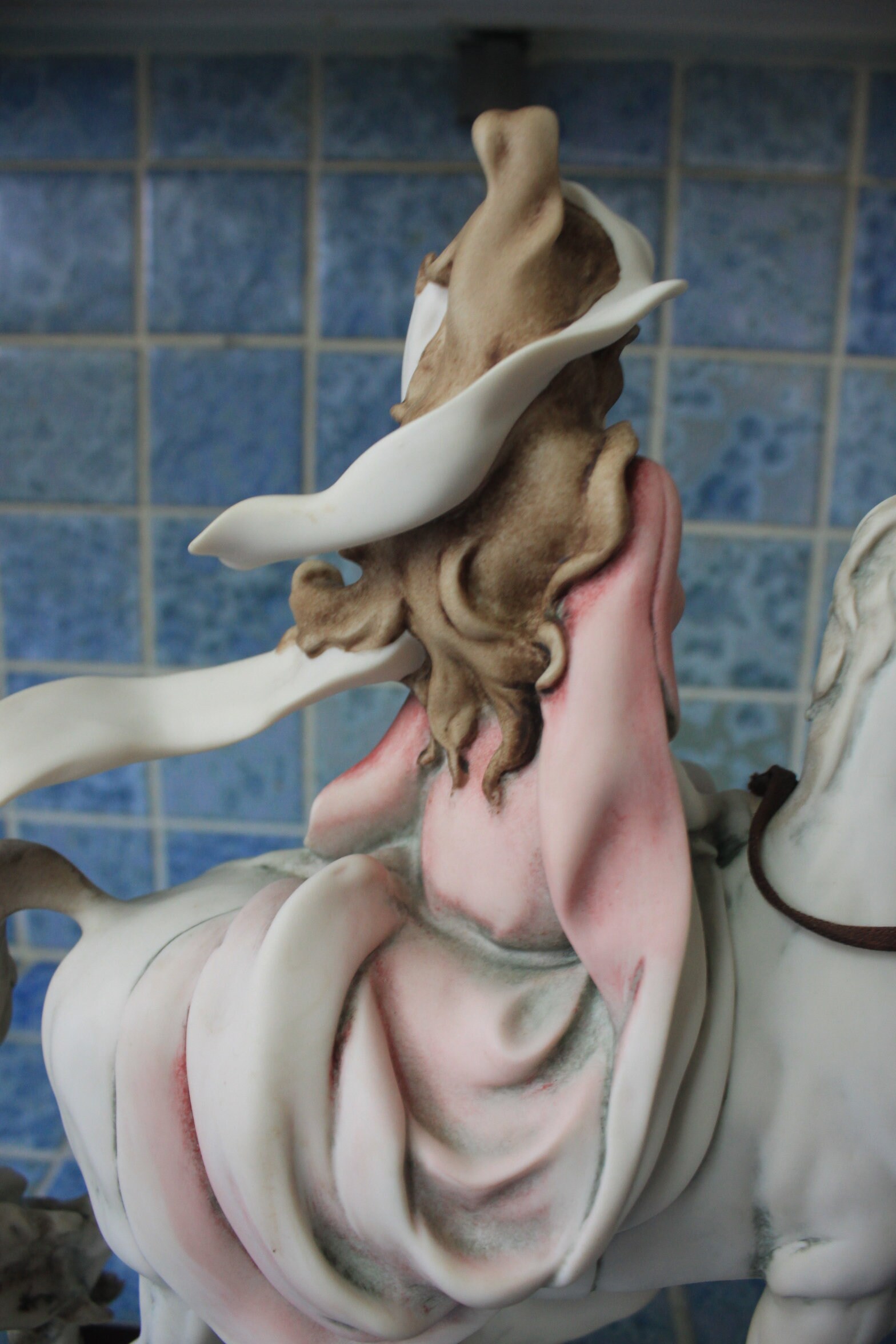 Capodimonte figurine of lady riding horse *By artist G. Armani, signed