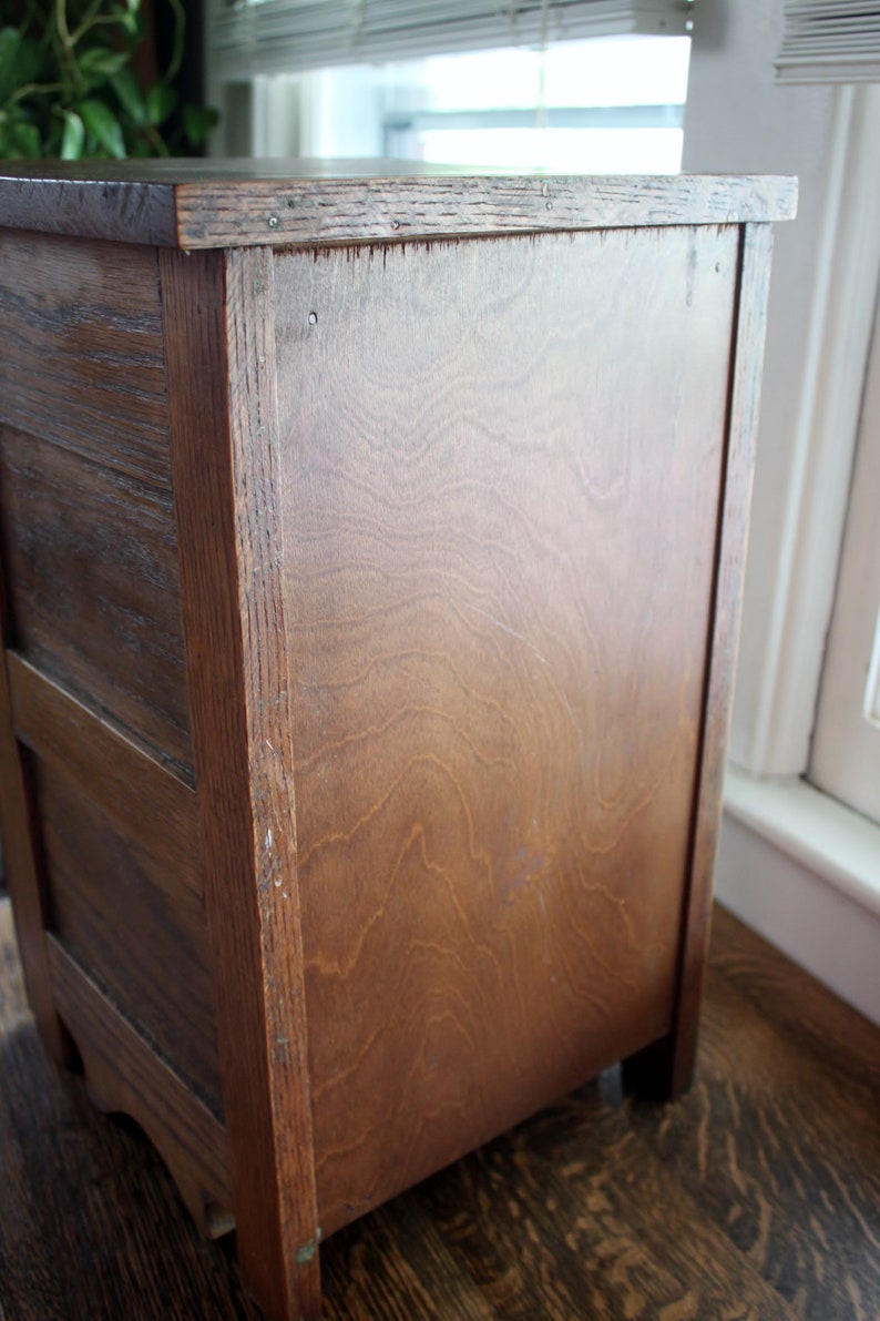antique salesman sample or child/'s small piece of furniture made of oak with one drawer and storage area underneath.