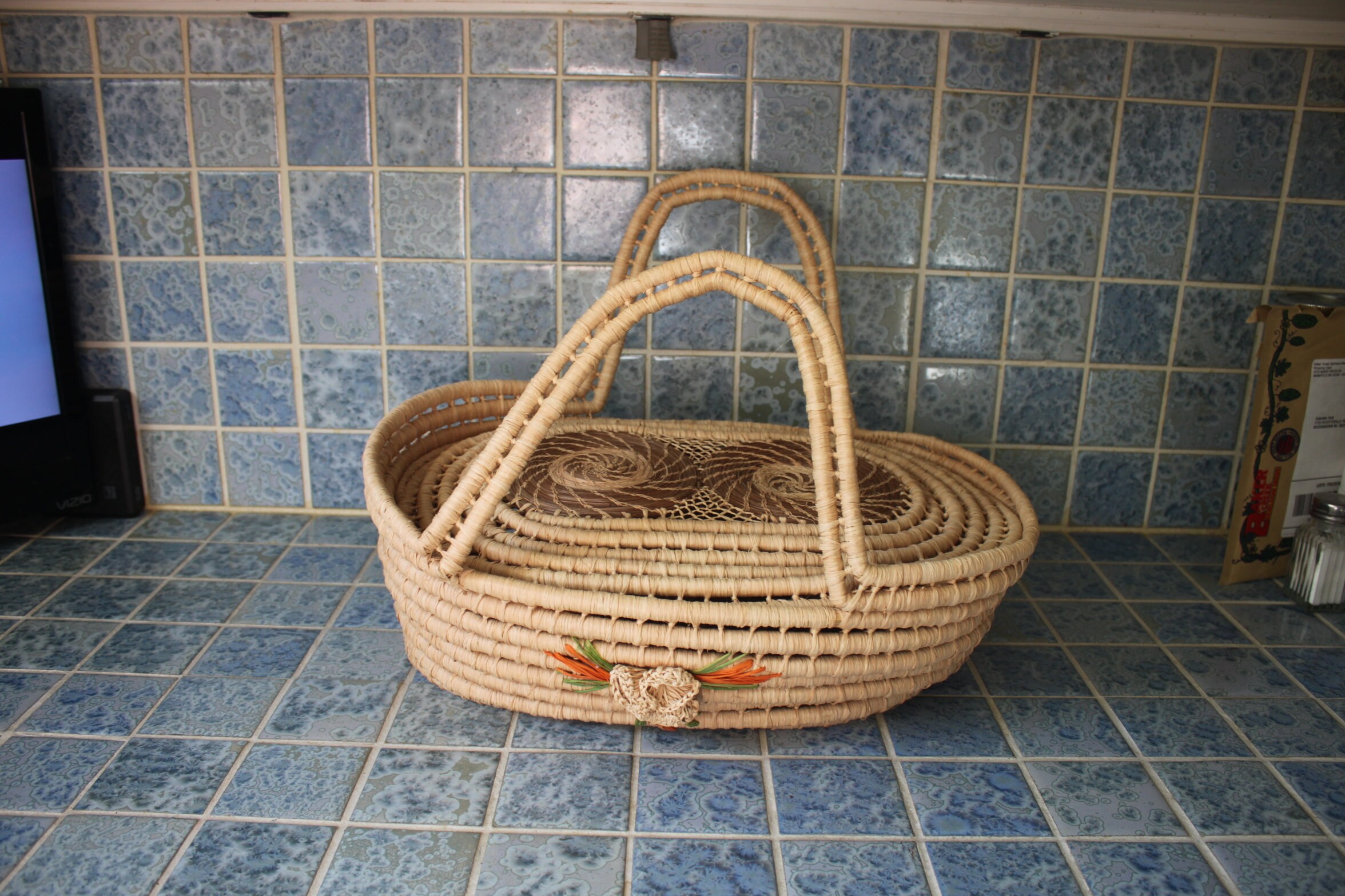 Vintage colorful woven straw basket with attached lid