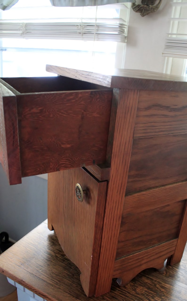 antique salesman sample or child/'s small piece of furniture made of oak with one drawer and storage area underneath.