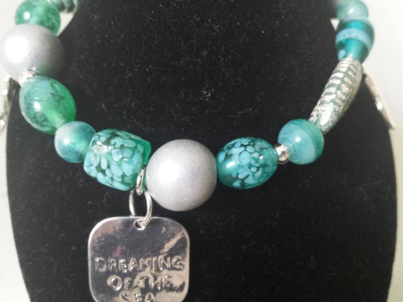 201799 Teal Glass and Silver Wood Bracelet with 3 Charms and Heart Toggle and Matching Earrings Set