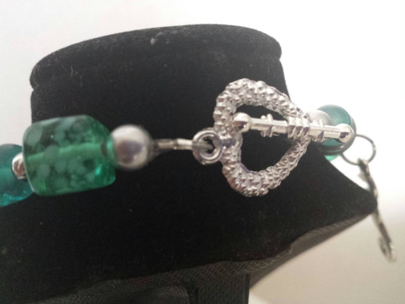 201799 Teal Glass and Silver Wood Bracelet with 3 Charms and Heart Toggle and Matching Earrings Set