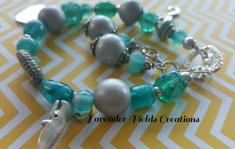 201799 Teal Glass and Silver Wood Bracelet with 3 Charms and Heart Toggle and Matching Earrings Set