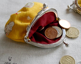 Purse with metal frame made with Japanese fabric with old man luck charm