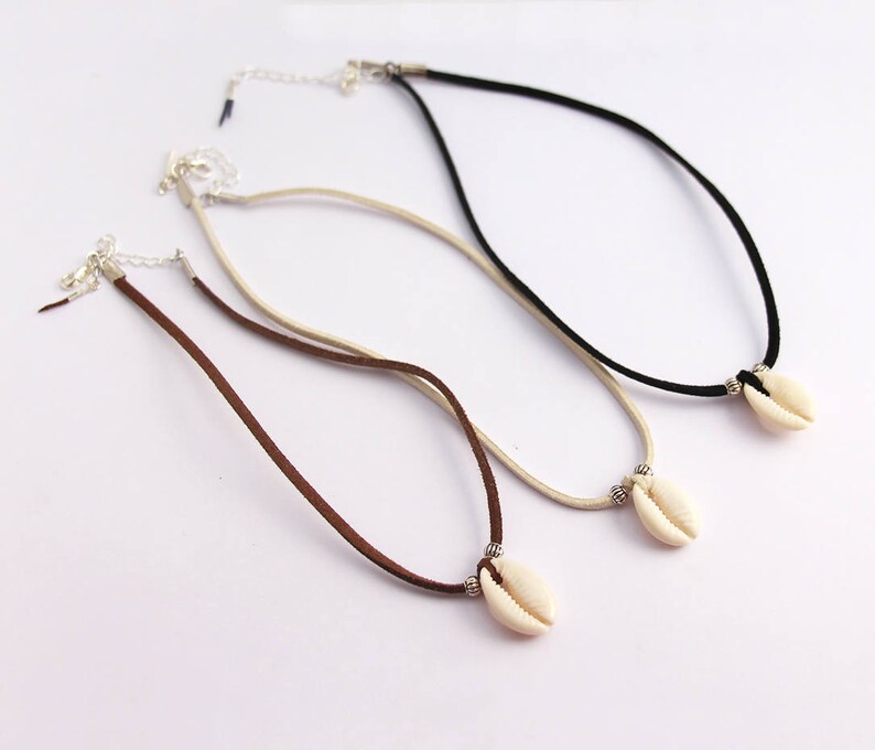 Leather and cowrie combo necklace and earrings set