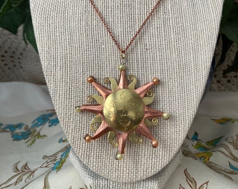 Vintage Copper and Brass Happy Sunburst Pendant on a 24" Copper Necklace.