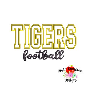 May include: A white background features the words "TIGERS football" in gold and dark purple script. A red apple with a floral design and the words "Apple Dumplin Design" are in the lower right corner.