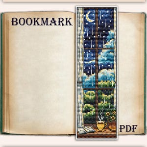 May include: Cross stitch pattern for a bookmark depicting a rainy night window. The design includes a crescent moon, raindrops, and a cup of tea. The bookmark measures 5.4 x 18.1 cm and has 30 x 100 stitches, with 34 colours.