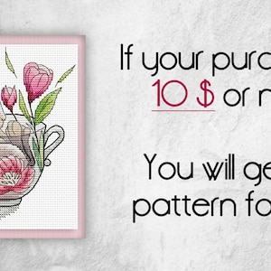 May include: A cross-stitch pattern featuring a brown bunny rabbit sleeping in a teacup with pink flowers. The text reads "If your purchase is 10$ or more You will get this pattern for FREE".