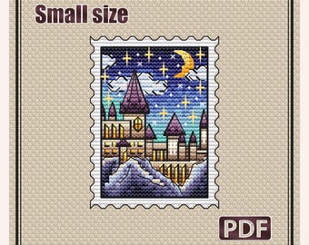 May include: A cross stitch pattern titled Magic School featuring a stamp-shaped design of a castle under a night sky with a crescent moon and stars. The pattern includes text, a PDF icon, and dimensions of 2.5 x 3.3 inches with 22 DMC colors.