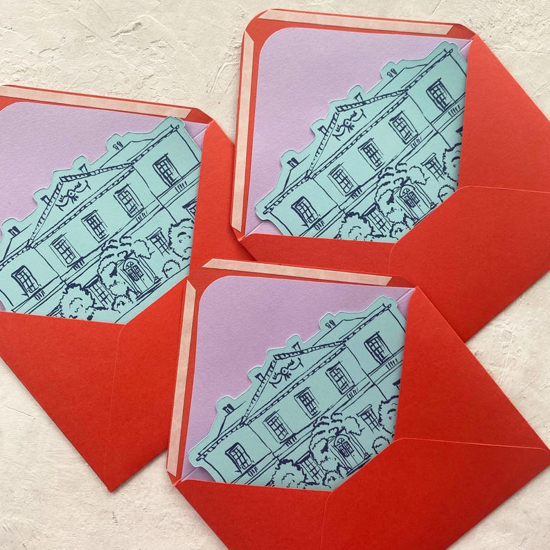 May include: Three red envelopes with rounded corners, each containing a light purple card with a teal illustration of a building. The building illustration is a detailed line drawing of a large house with trees.
