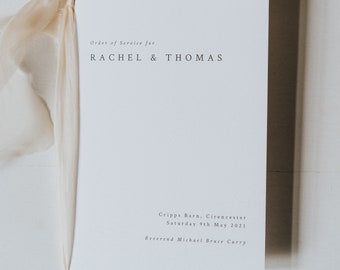 May include: A white wedding ceremony order of service booklet with the text "Order of Service for Rachel & Thomas" and "Cripps Barn, Cirencester, Saturday 9th May 2021, Reverend Michael Bruce Curry".