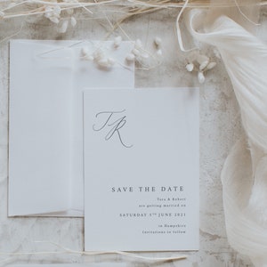 Save the date printed on off white card - Wedding save our date with logo or emblem