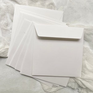 White square envelopes for wedding cards