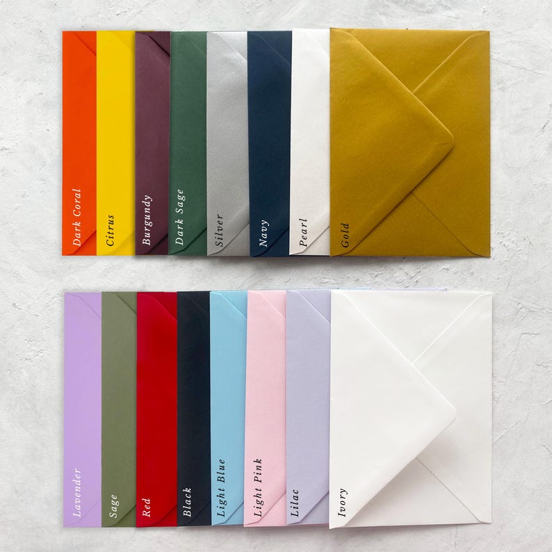 May include: A collection of colorful envelopes in various shades, including dark coral, citrus, burgundy, and gold. The envelopes are arranged in two rows, with the colors labeled. The top row features darker hues, while the bottom row showcases lighter shades.